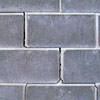 A diagonal stair-step crack found along a foundation wall in a Sterling home