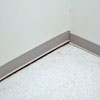 A partition wall separating from the floor in a Gainsville home.