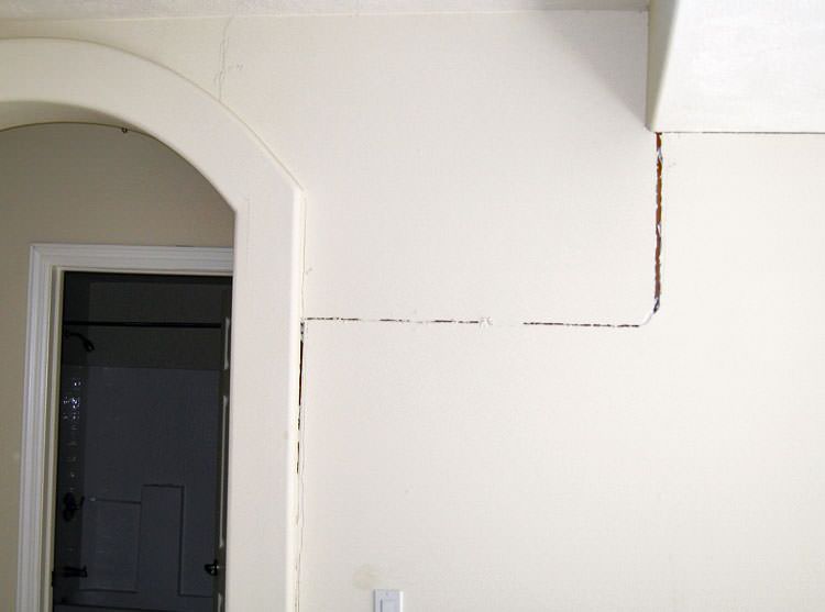 Drywall cracking due to foundation settlement in Sterling