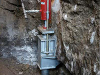 Foundation repair contractors lifting a structure in Arlington.