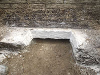 Preparing a foundation footing for helical pier installation in Bethesda