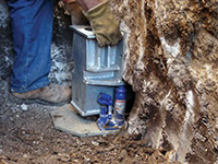 Securing a foundation footing bracket for a foundation repair system in Fort Washington.