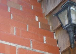 a repaired chimney in Springfield that had shown serious foundation damage and was repaired with a helical pier system.