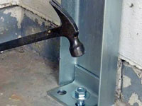Mounting a foundation channel anchor installation to the floor in Sterling.