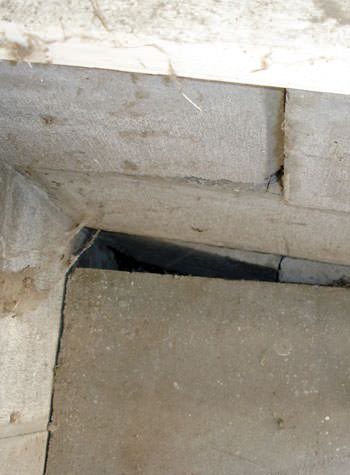 inward rotation of a foundation wall damaged by street creep in a garage in Bowie