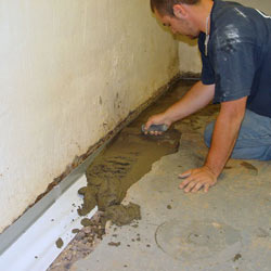 Testing a French drain system in a Leesburg home.
