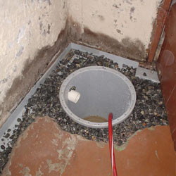 Installing a sump in a sump pump liner in a Alexandria home