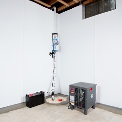Sump pump system, dehumidifier, and basement wall panels installed during a sump pump installation in Derwood
